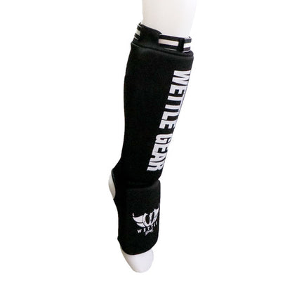 PROTÈGE-TIBIAS/PIEDS HAUT DE GAMME EN COTON ÉLASTIQUE – NOIR – WETTLE GEAR