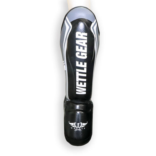PROTÈGE-TIBIAS/PIEDS PRO DE MUAY THAI PU »REVOLUTION » – WETTLE GEAR