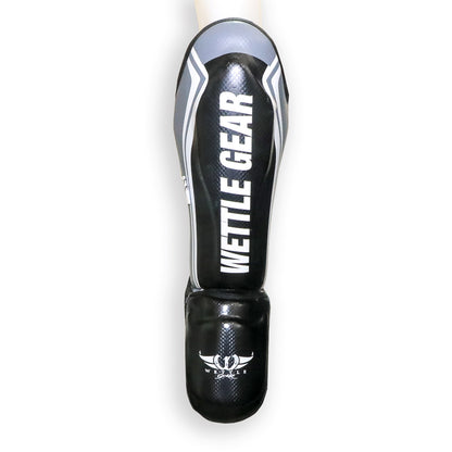 PROTÈGE-TIBIAS/PIEDS PRO DE MUAY THAI PU »REVOLUTION » – WETTLE GEAR